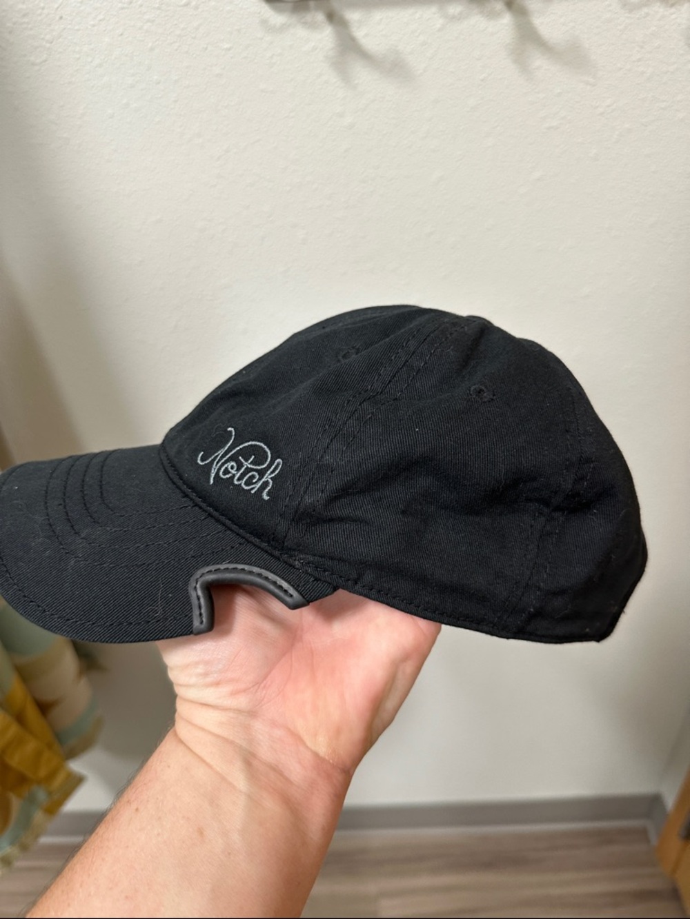 Notch women Black Embroidered Baseball Cap with ponytail opening.